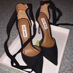 Black suede tie-up high heel Steve Madden shoes.